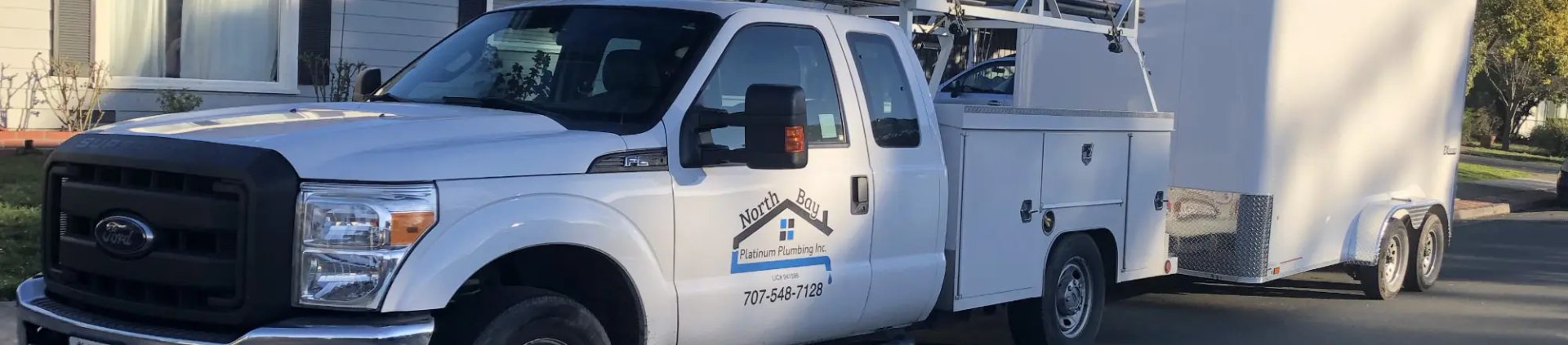 Photo of a plumber detecting a leak